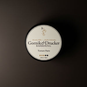 Gornik & Drucker Barbering Texture Paste container on a dark background