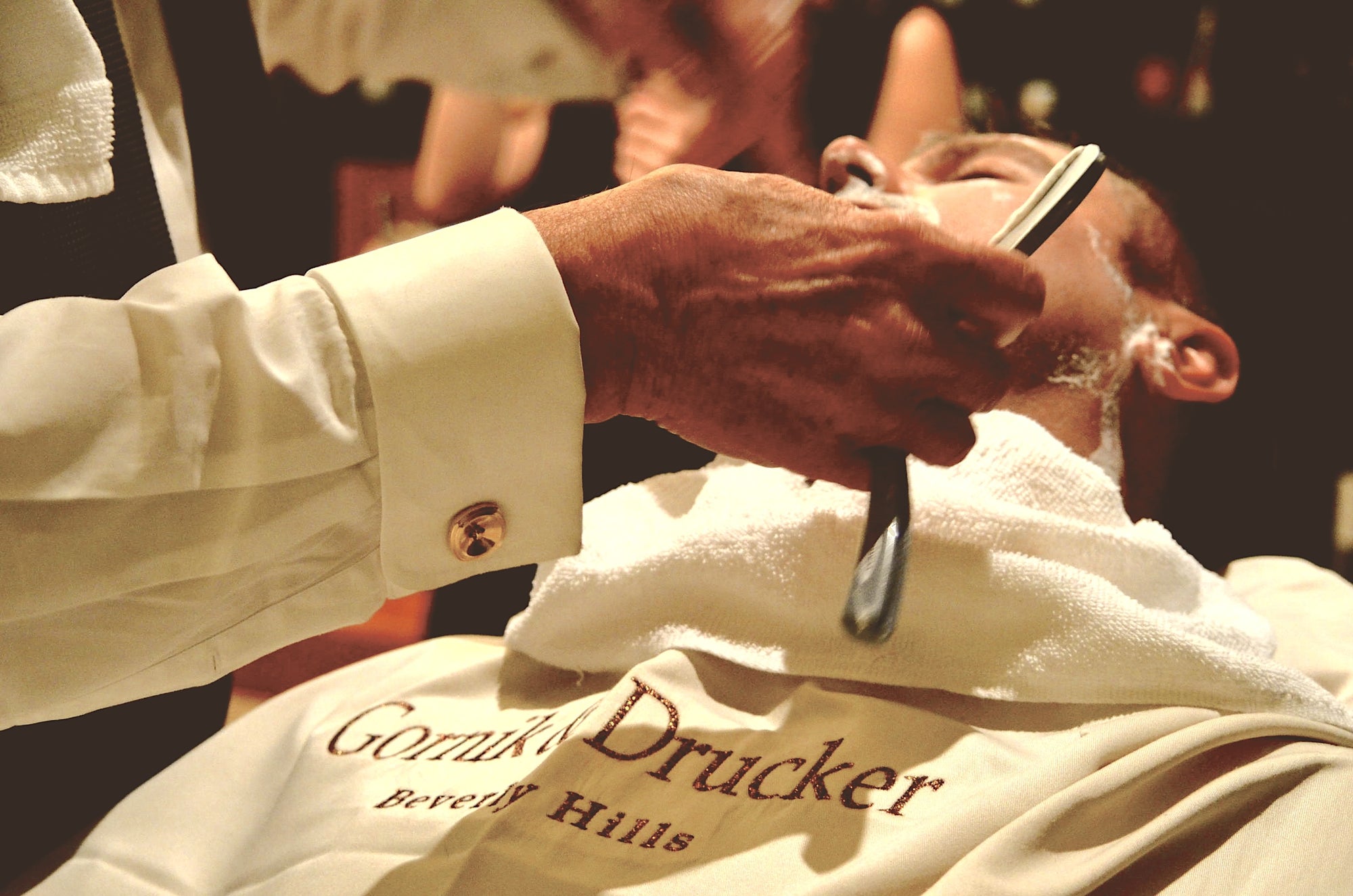 Barber giving a shave