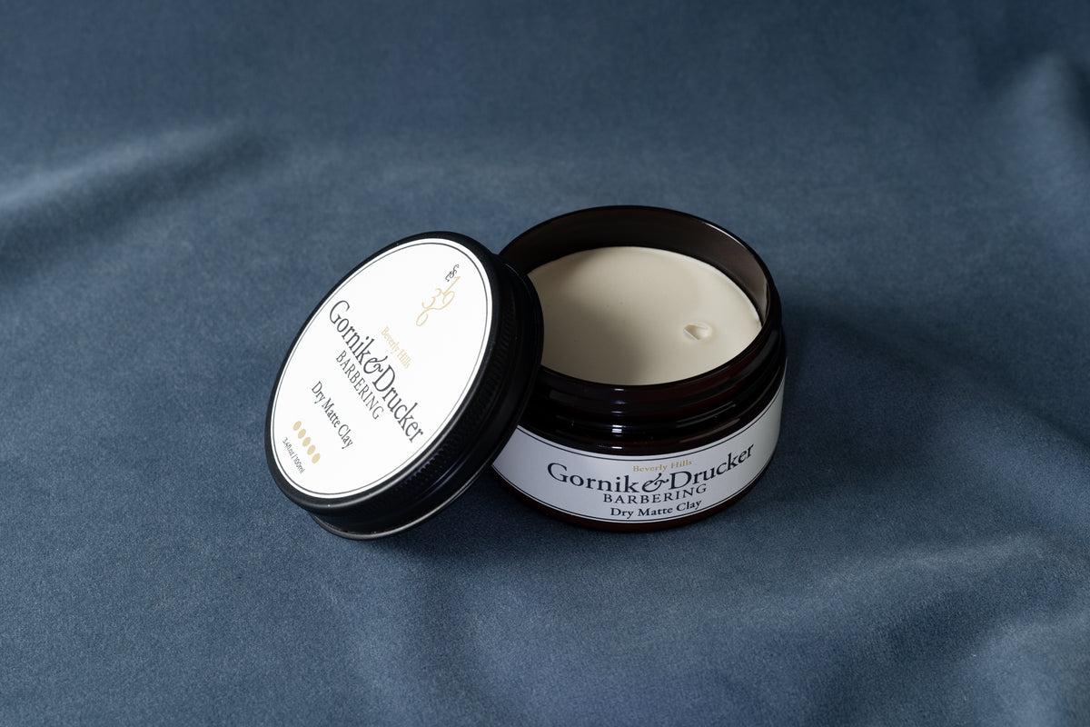 Dry Matte Clay jar open beside its lid