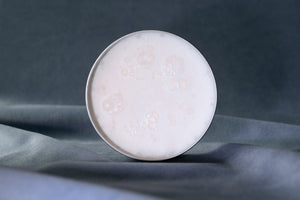The soft texture of Shaving Cream in the open jar