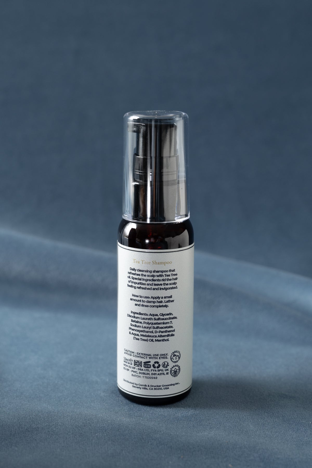 Back label of Tea Tree Shampoo, travel size, with directions and ingredients
